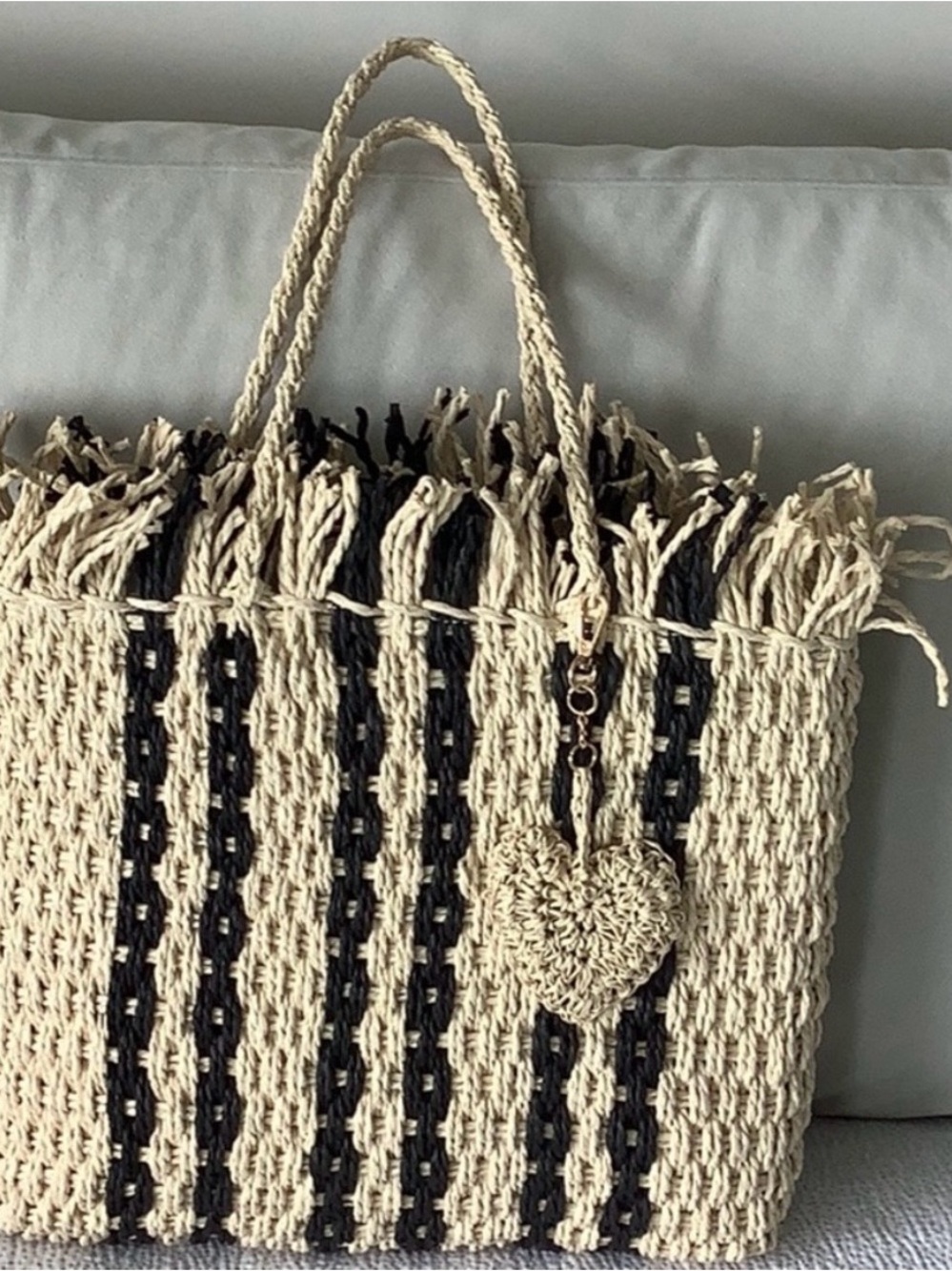 Woven beach bag by Haute Hippee